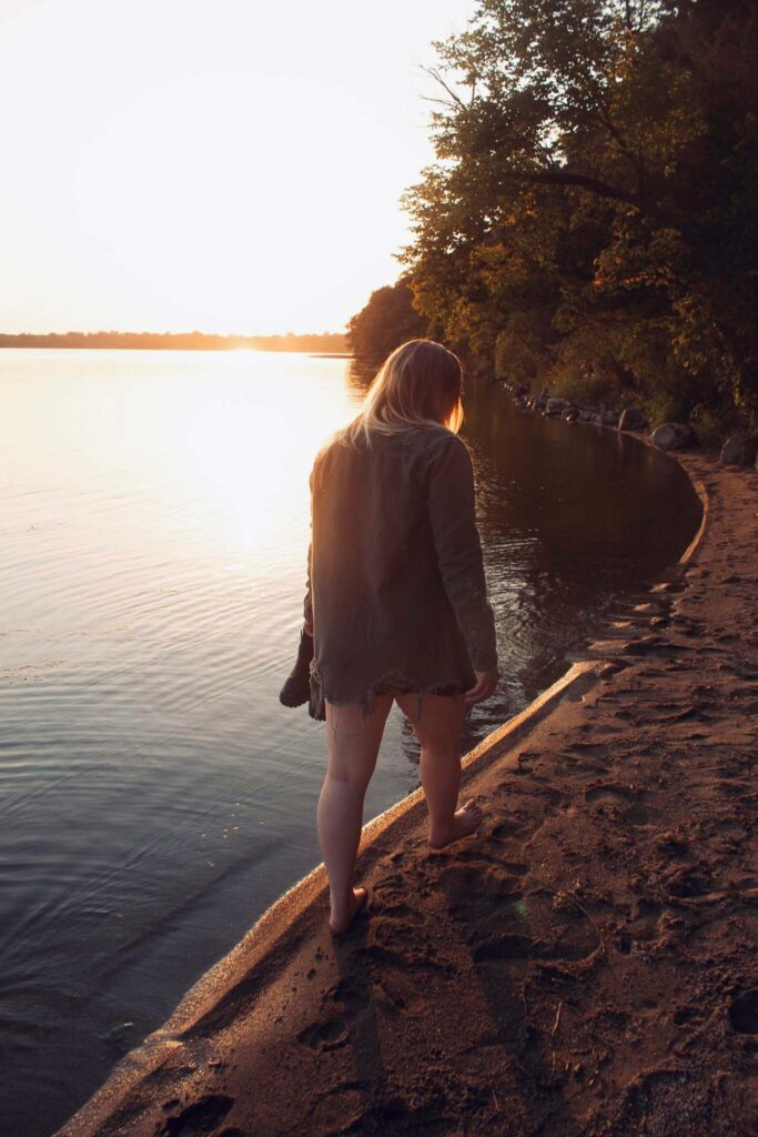 Women walking in lake